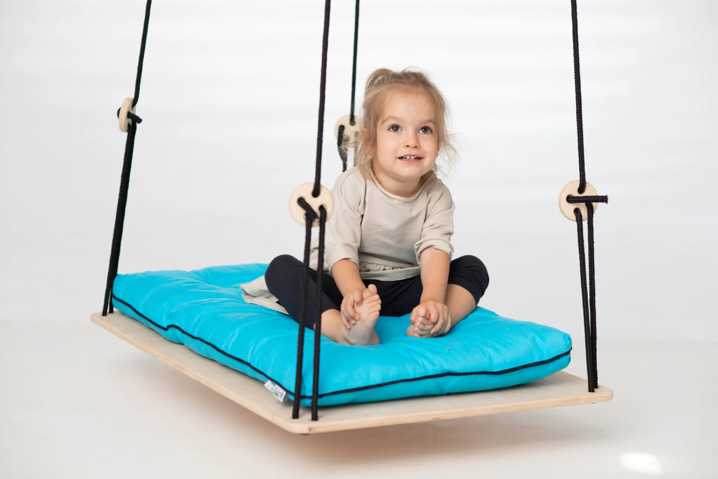 girl sitting on SENSORY PLATFORM- GOOD WOOD