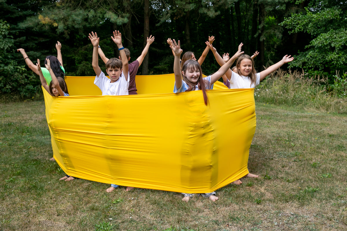 kids playing in the yellow flexible circle 