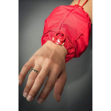 Cargar imagen en el visor de la galería, Human hand dressed in red Cotton Wrist Weights - Sensory Owl